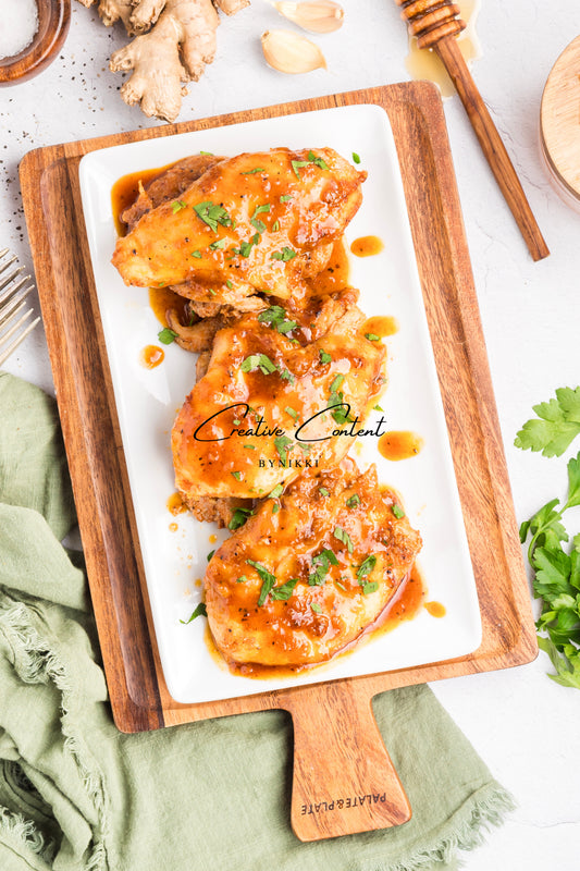 Honey garlic chicken on a platter.
