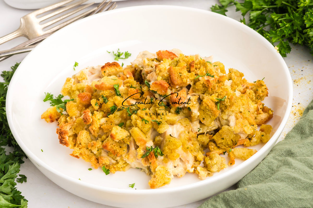 Church cookbook chicken casserole with a crispy breadcrumb topping in a white bowl