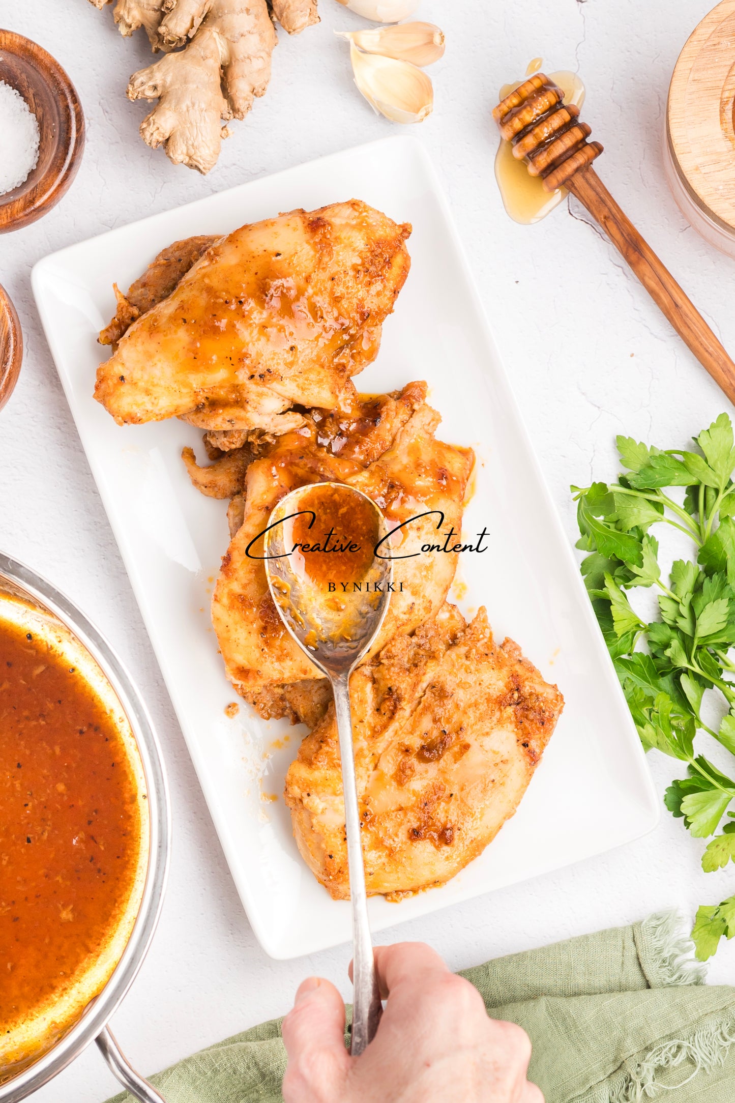 spooned sauce over the chicken