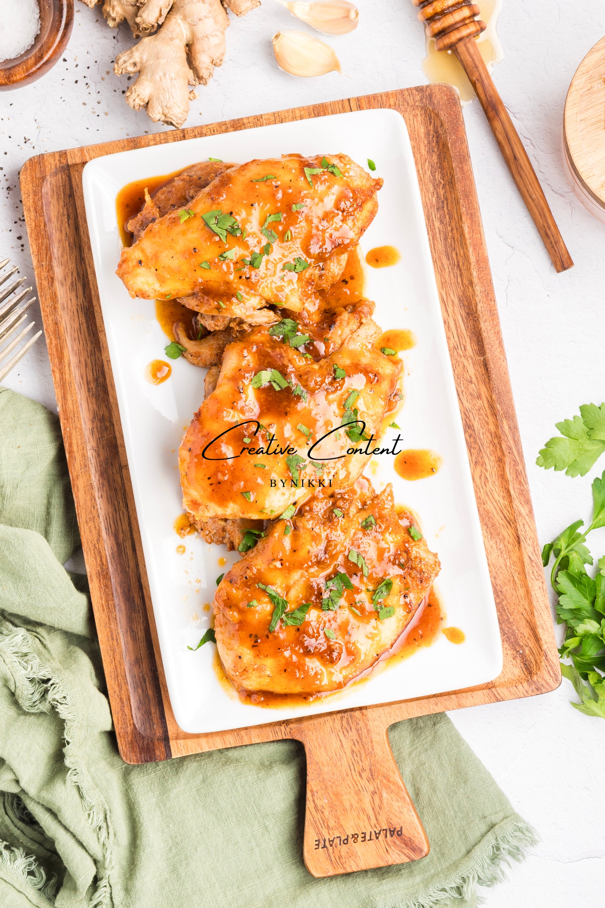 Honey garlic chicken on a platter. 