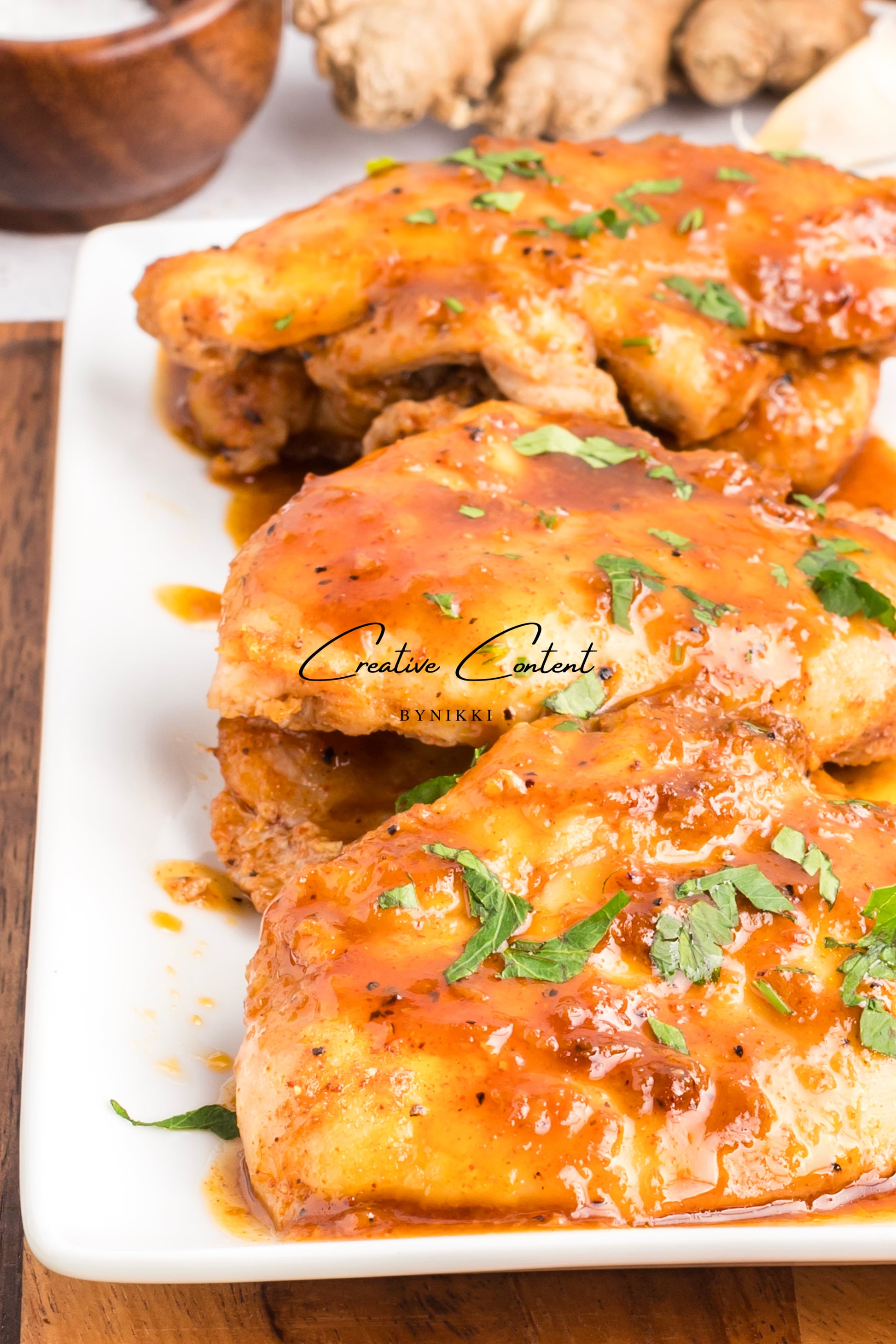 Honey garlic chicken on a platter. 