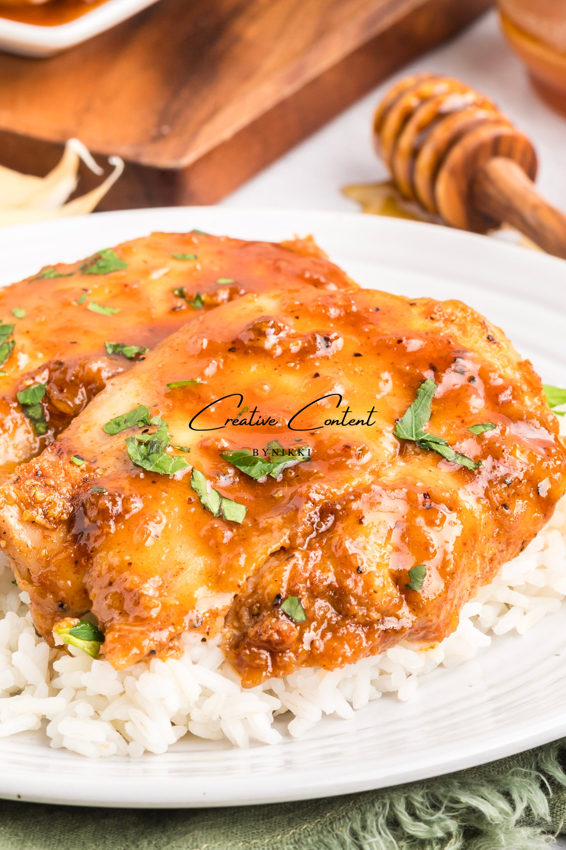 Honey garlic chicken on a platter. 