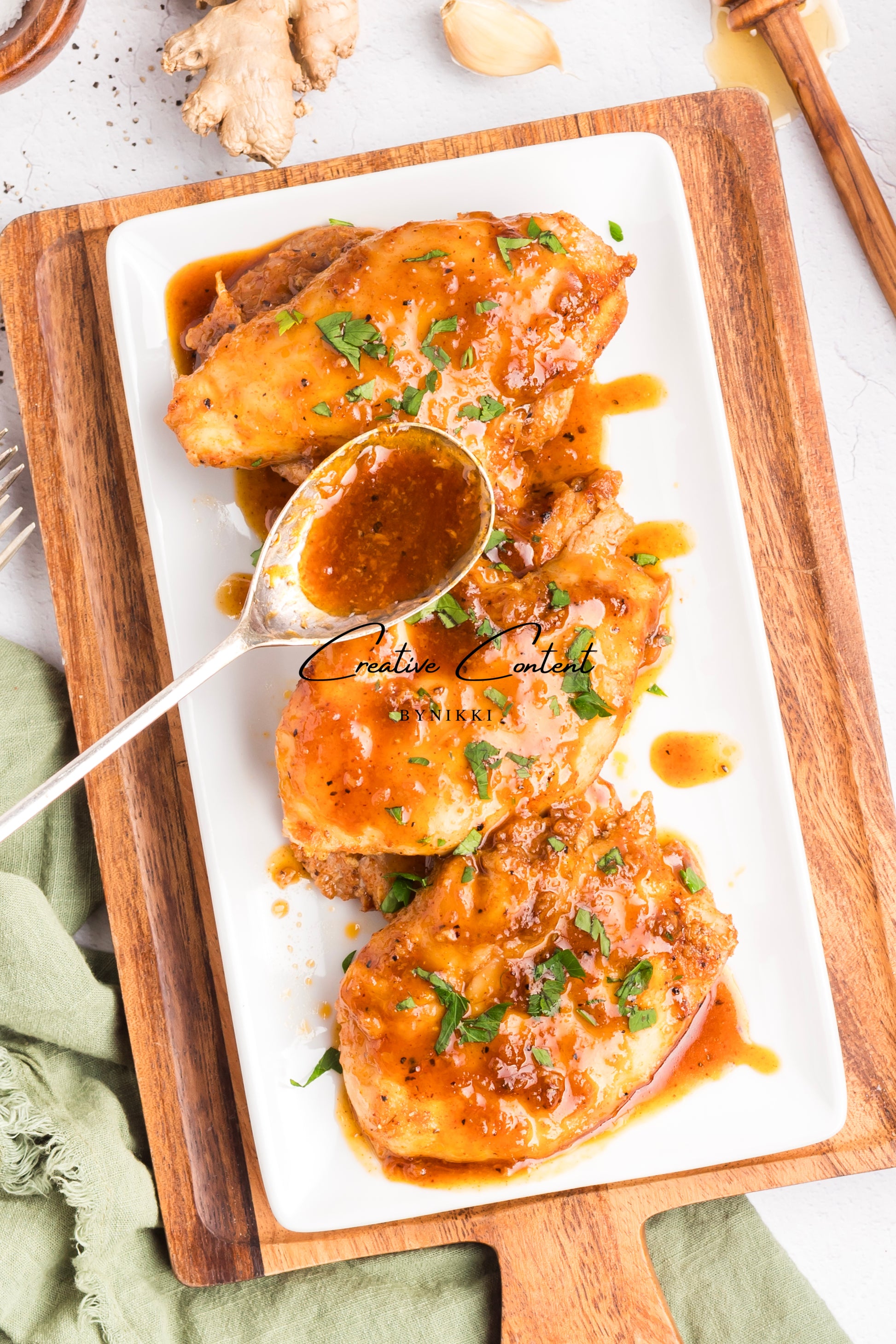 Honey garlic chicken on a platter. 
