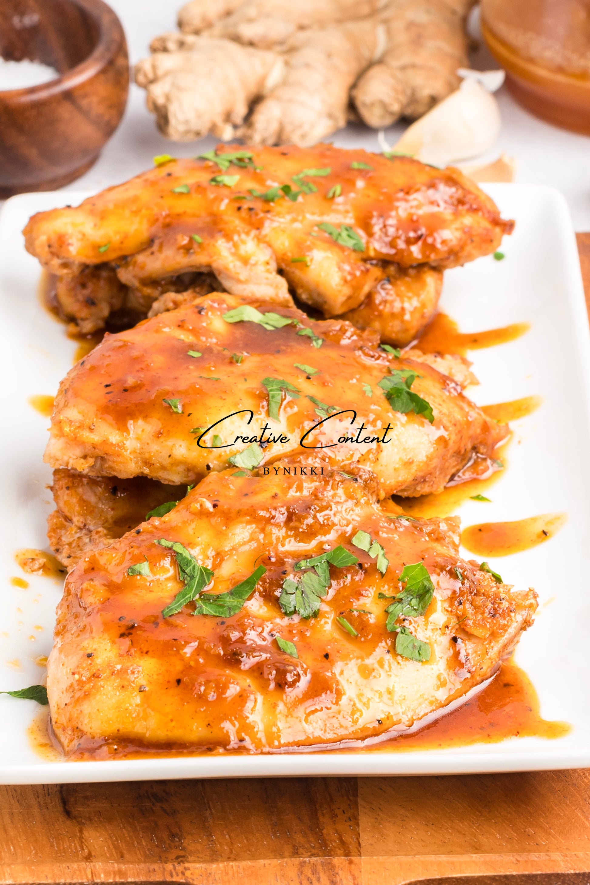 Honey garlic chicken on a platter. 