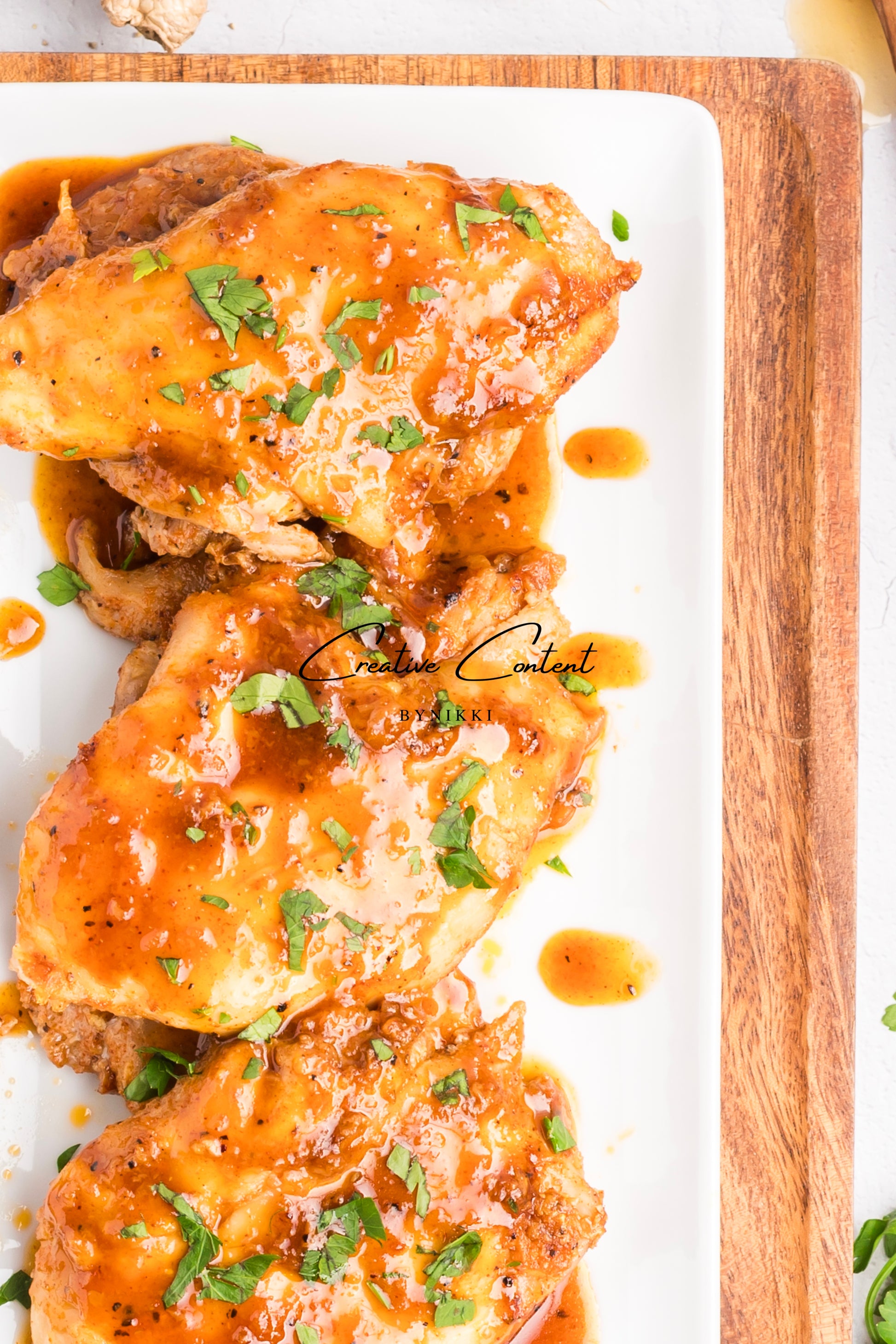 Honey garlic chicken on a platter. 