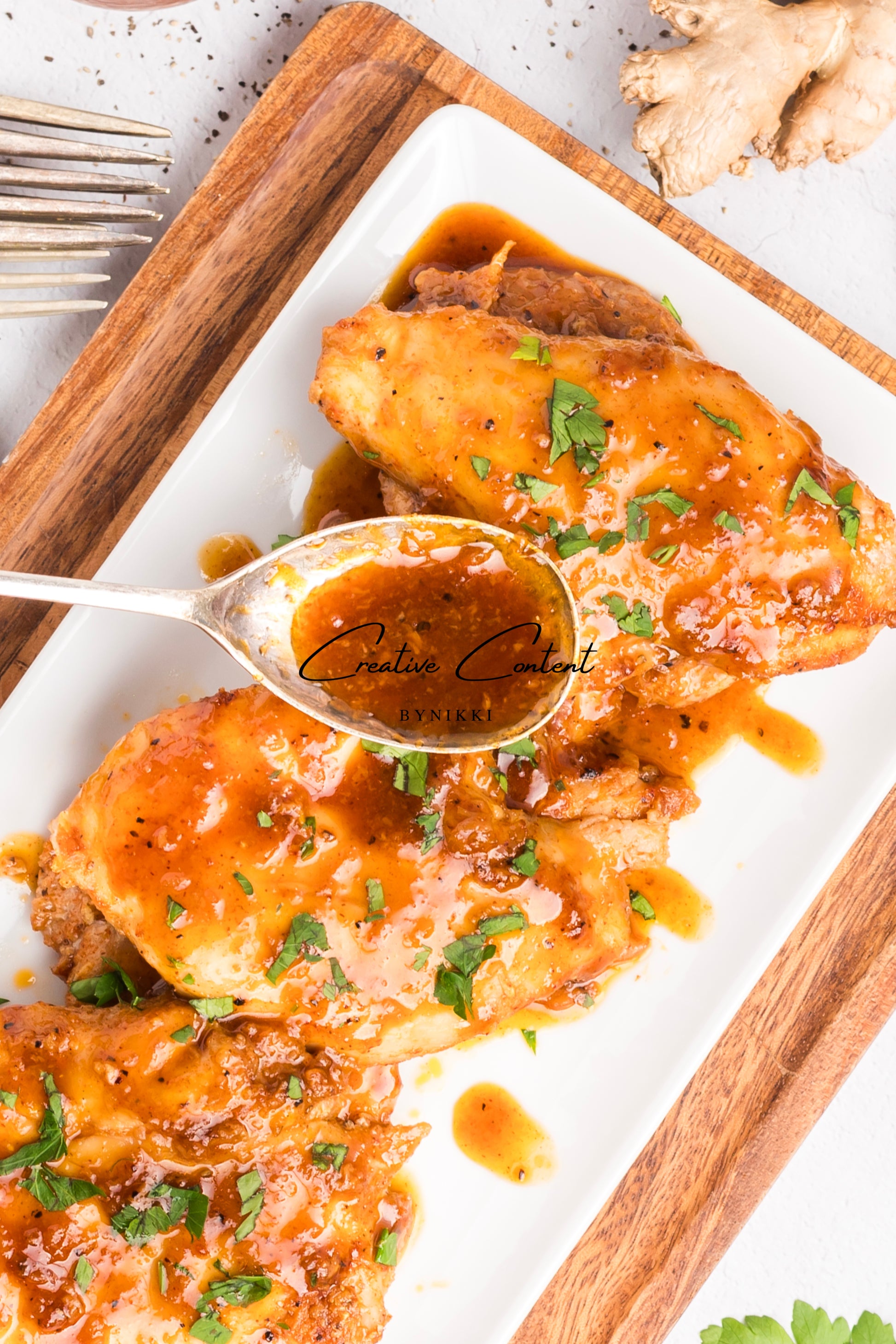 Honey garlic chicken on a platter. 
