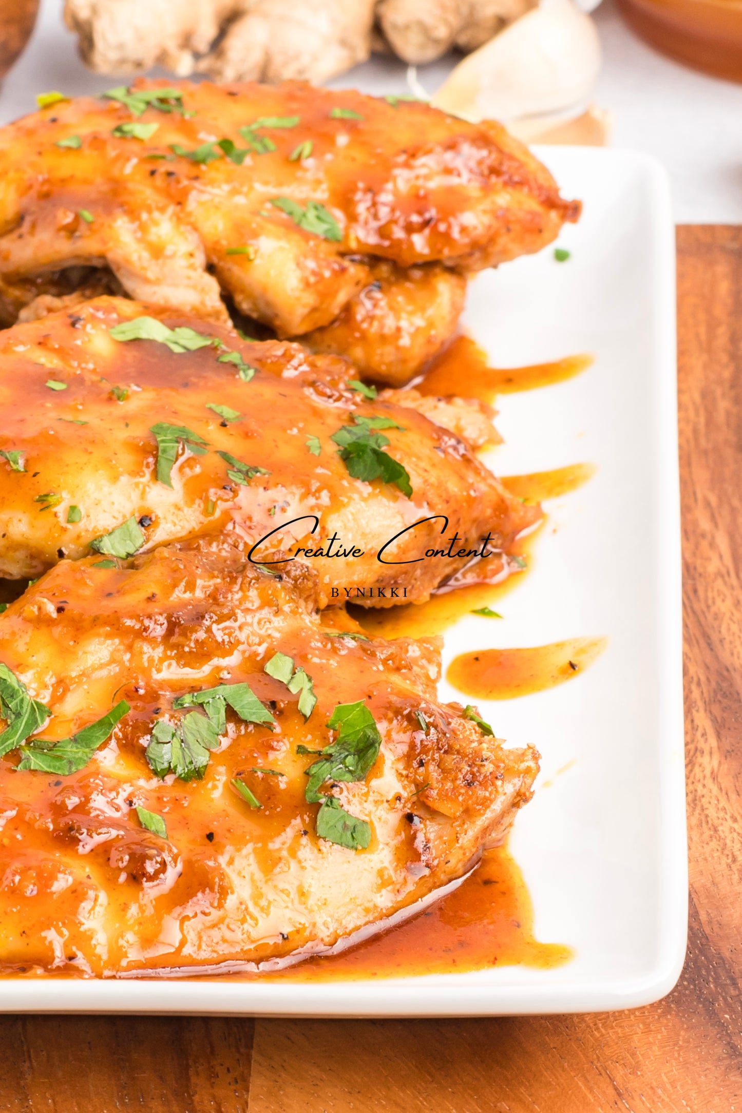 Honey garlic chicken on a platter. 