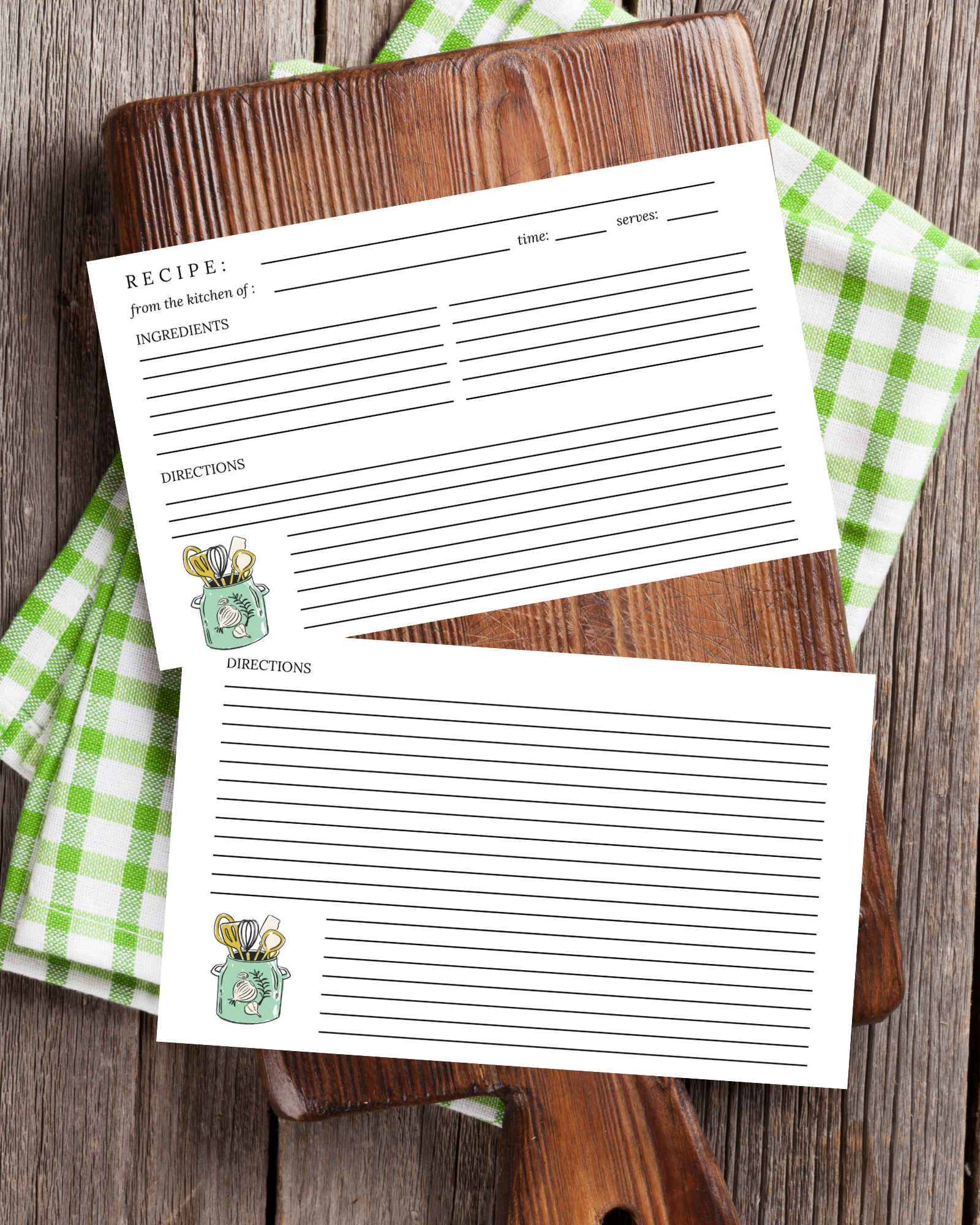 Two recipe cards on a wooden cutting board with green checkered cloth underneath.